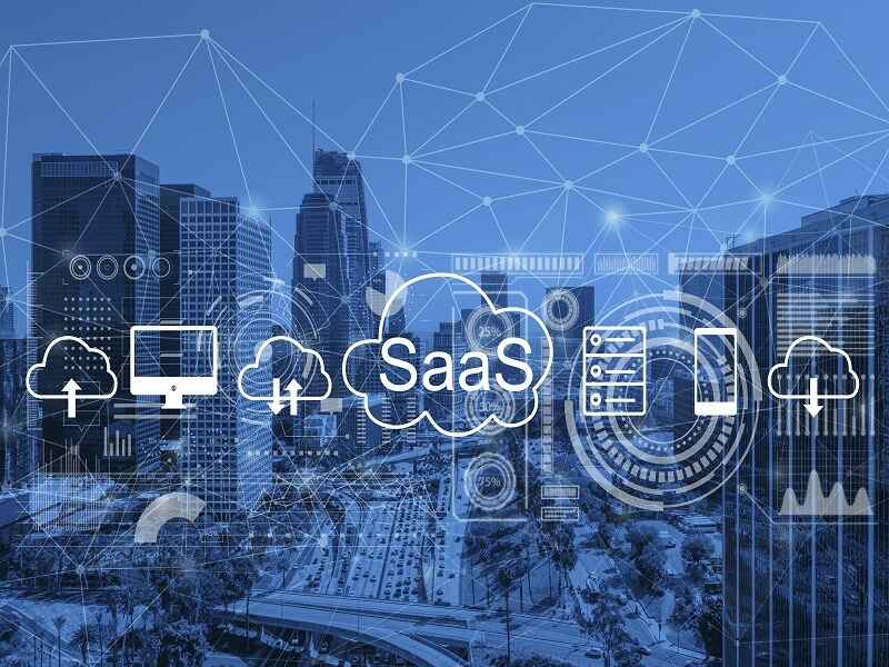 Modern SaaS illustration featuring cloud technology icons over a cityscape background, representing the integration of software solutions in various business sectors.